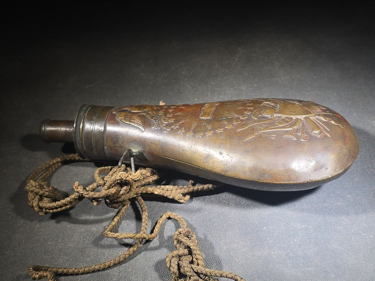 Antique N.P. Ames "Peace" Pattern Brass Powder Flask with Eagle, Clasped Hands, Stars, and "US" Shield with Military Trophy, Dated 1838, Springfield, Massachusetts, with Braided Cord Carry Strap
