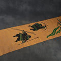 Lot 109 - Vintage Screen-Printed Burlap Panel in the Style of Helen Kalvak with Inuit Hunting Figures, 8-1/2" W x 36" H