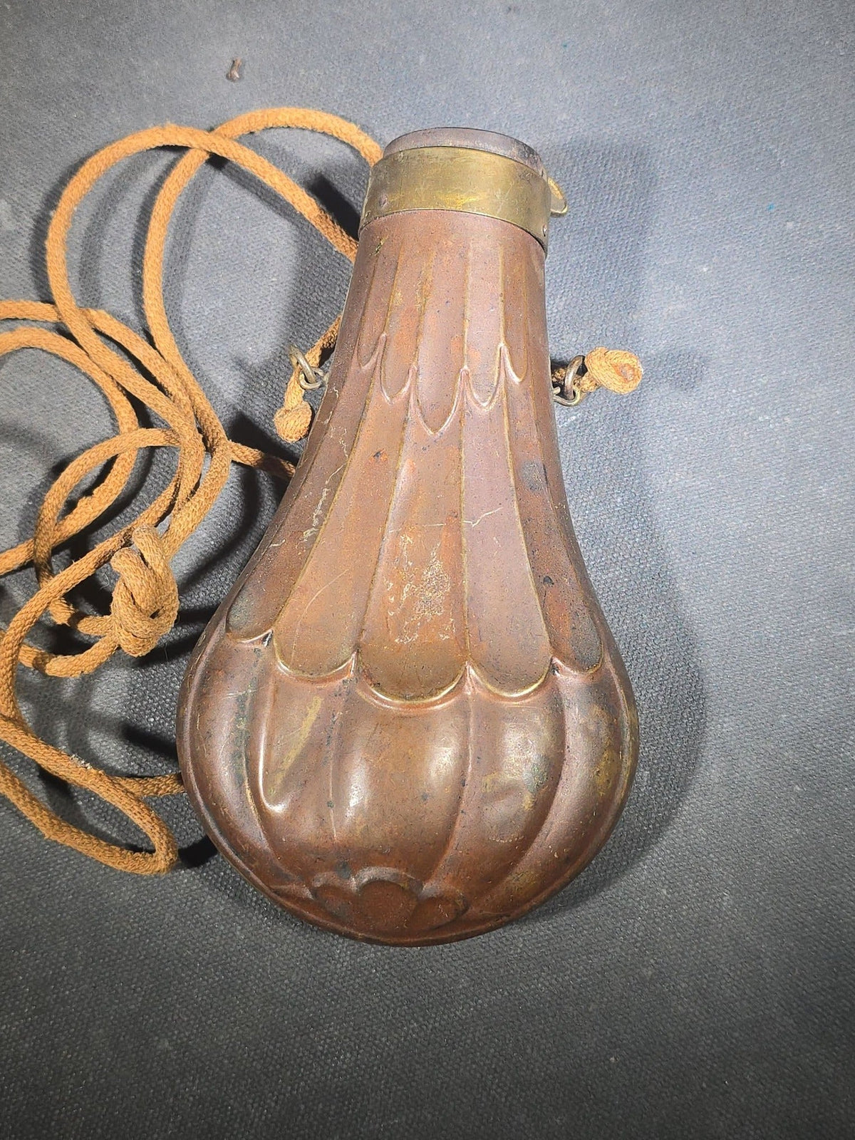 Antique Copper and Brass Powder Flask with Embossed Fluted Body and Cord Carry Strap