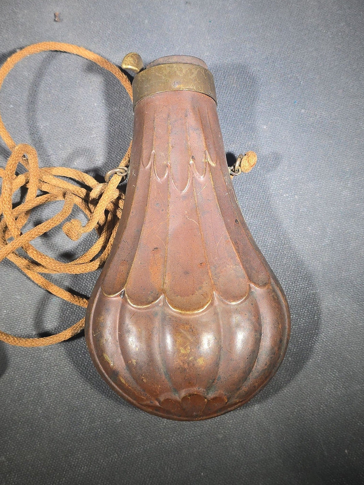Antique Copper and Brass Powder Flask with Embossed Fluted Body and Cord Carry Strap
