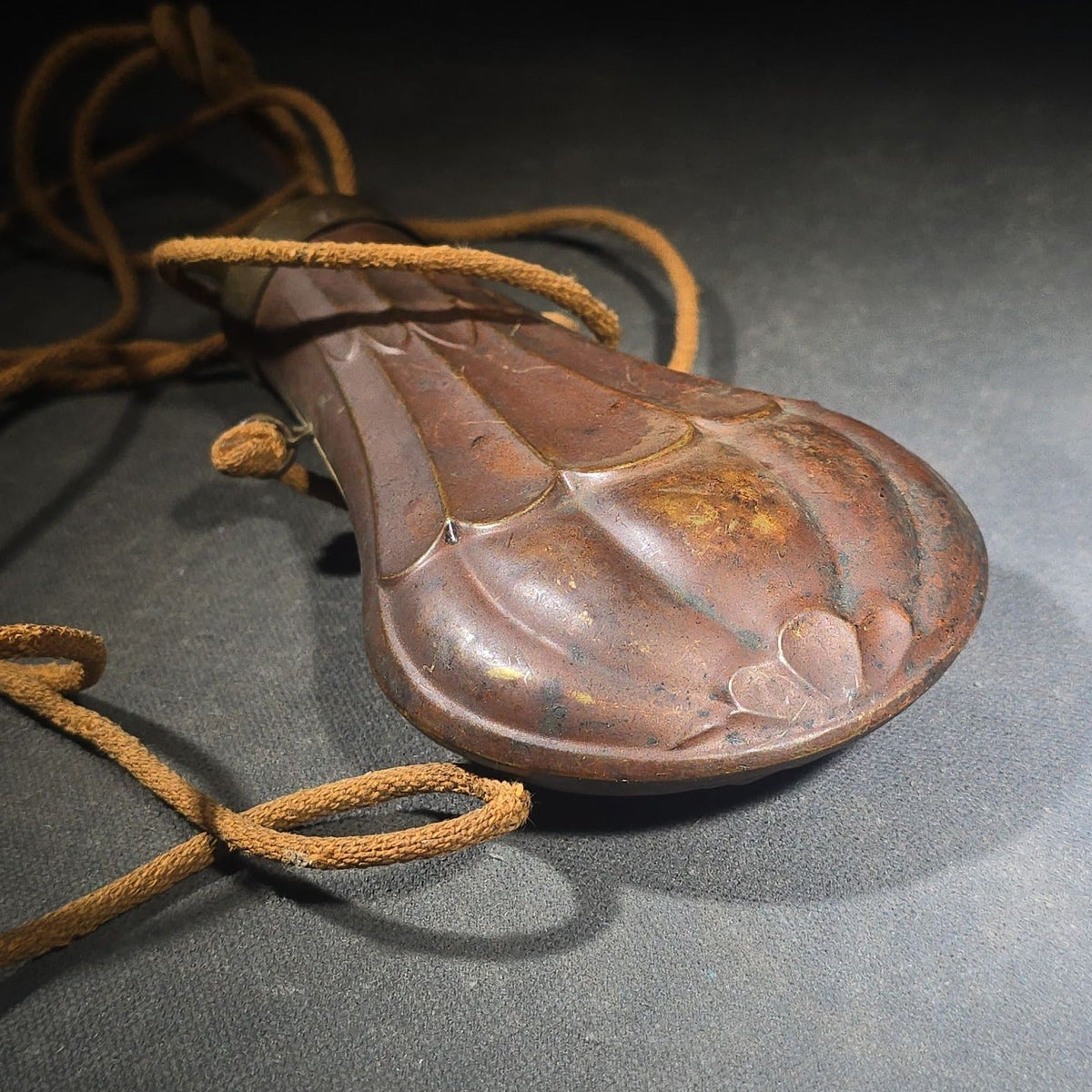 Antique Copper and Brass Powder Flask with Embossed Fluted Body and Cord Carry Strap
