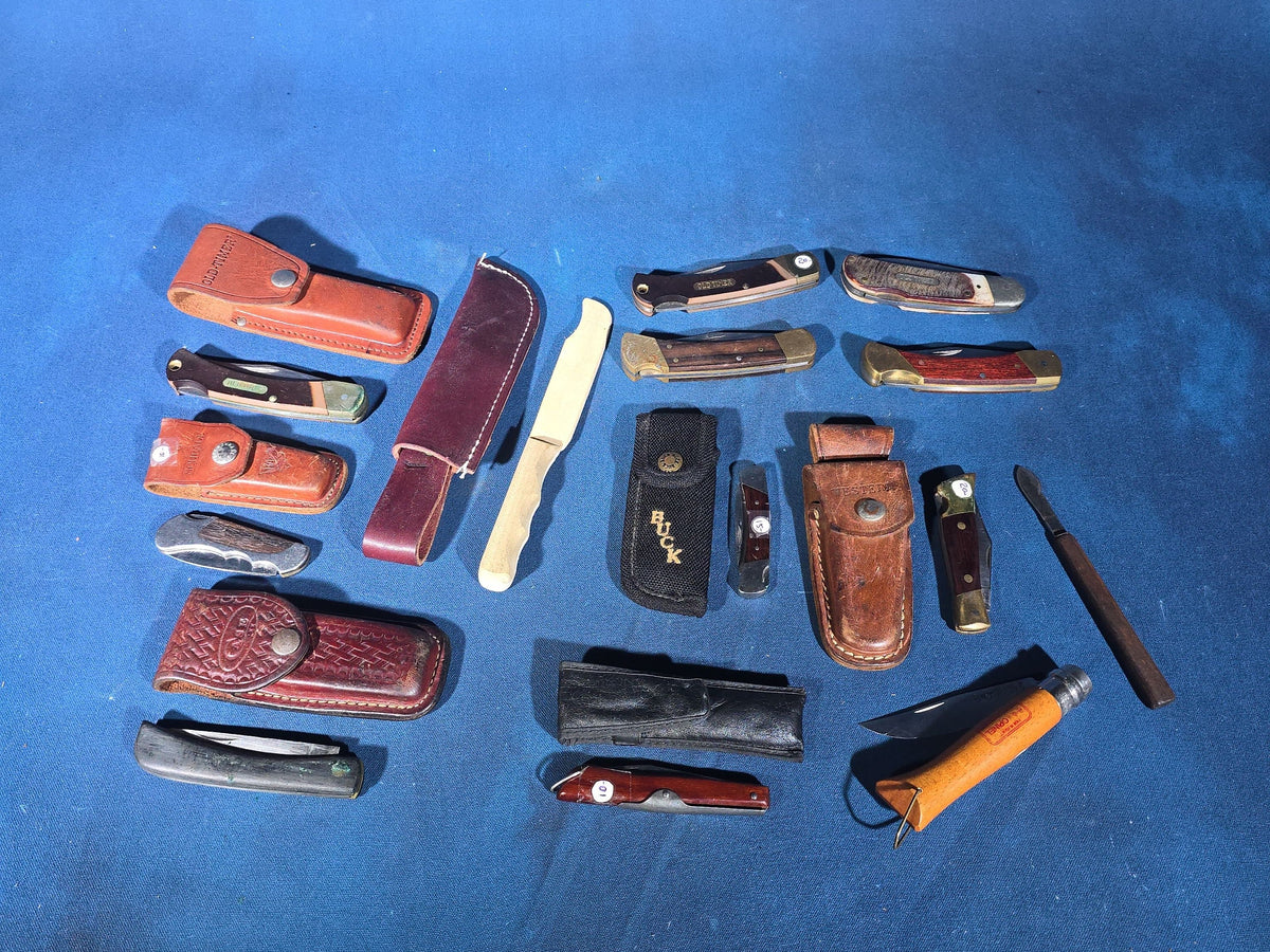 Grouping of 14 Vintage Folding and Pocket Knives with Sheaths including Buck, Schrade Old Timer, Western, Gerber, Case, and Opinel