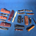 Lot 178 - Grouping of 14 Vintage Folding and Pocket Knives with Sheaths Including Buck, Schrade Old Timer, Western, Gerber, Case, and Opinel