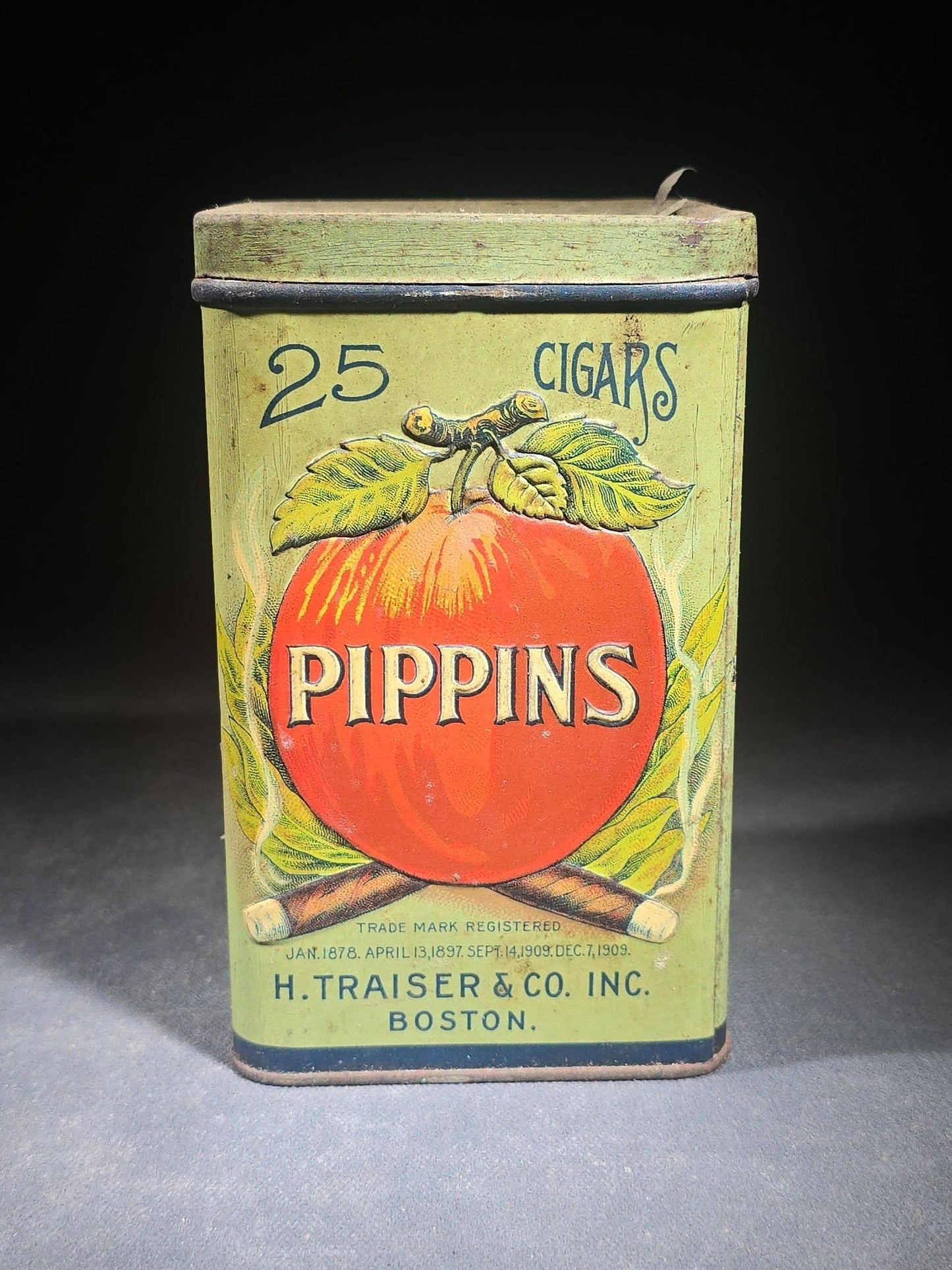Antique Pippins 25 Cigars Tin Lithograph Advertising Canister with Apple and Crossed Cigars Graphics, H. Traiser & Co. Inc., Boston, Massachusetts