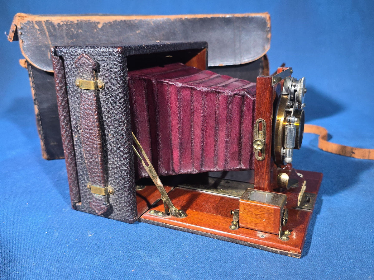 Antique Sears, Roebuck & Co. Mahogany Folding Plate Camera with Bausch & Lomb Unicum Shutter, Red Bellows, and Leather Carrying Case
