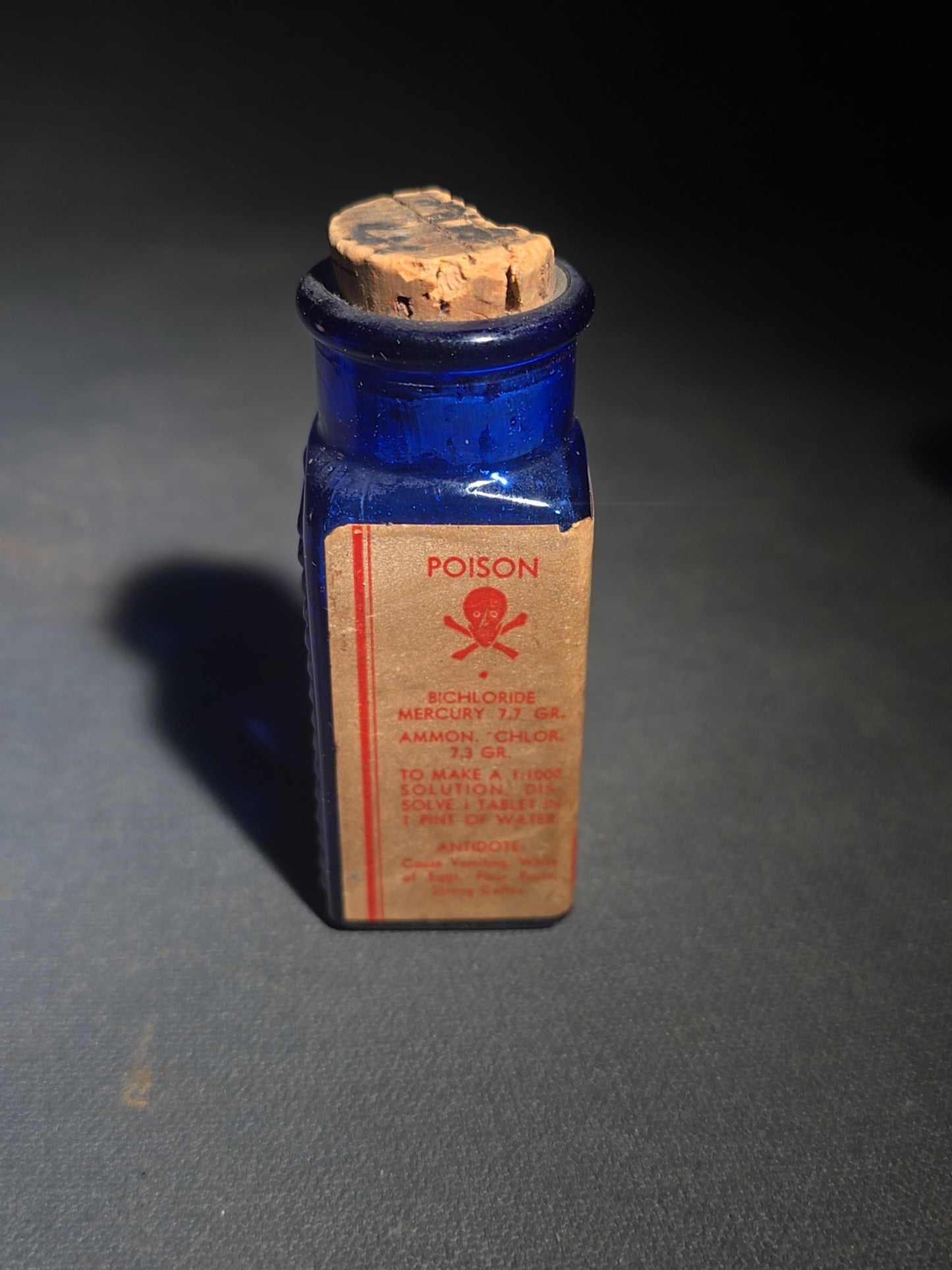 Grouping of Seven Antique and Vintage Apothecary Smalls including Belladona Leaves and Iodine Tincture Poison Bottles, Bichloride Mercury Poison Bottle, Cobalt Blue Eye Cup, and Sheaffer Skrip Ink Bottle