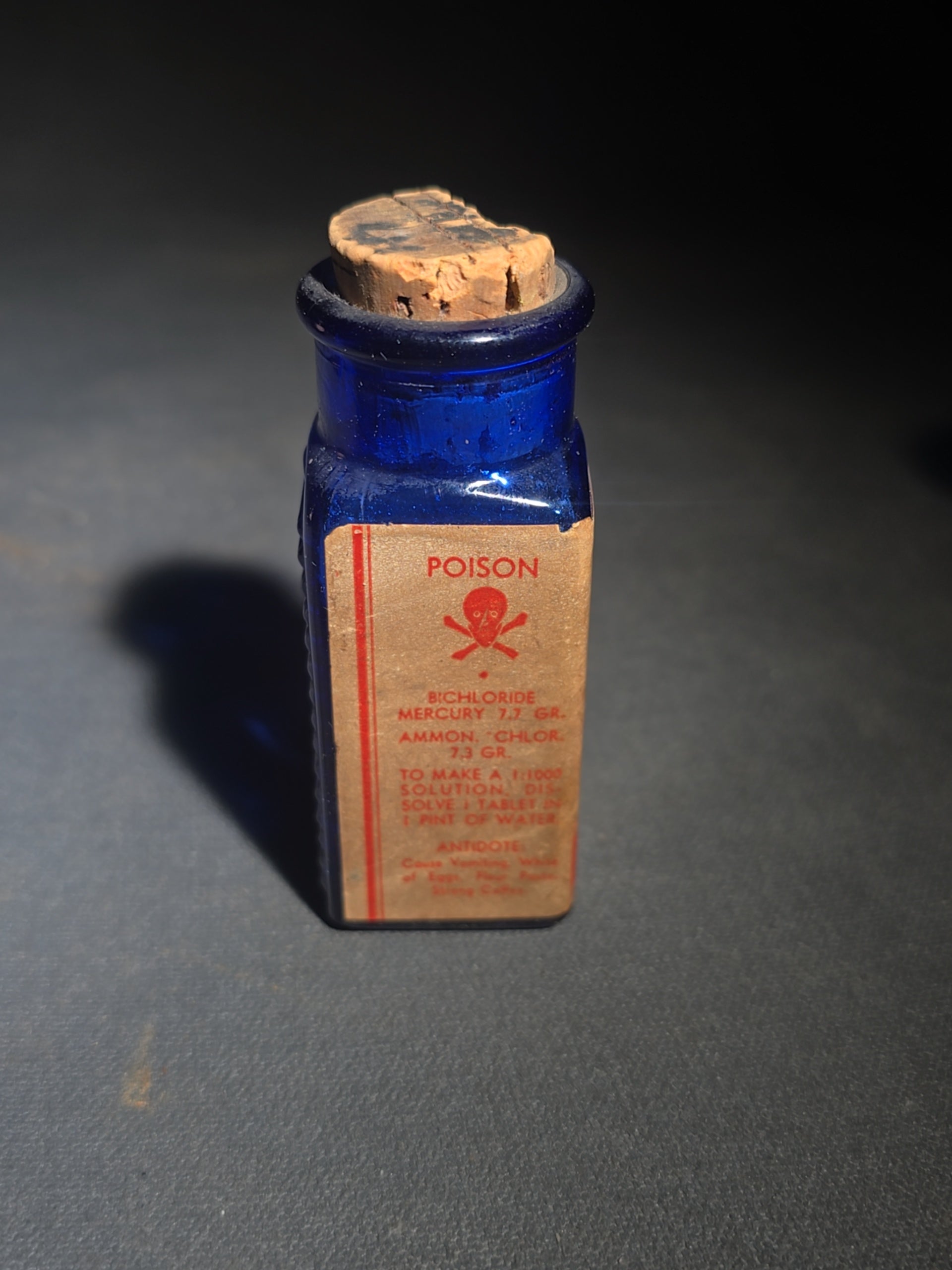 Grouping of Seven Antique and Vintage Apothecary Smalls including Belladona Leaves and Iodine Tincture Poison Bottles, Bichloride Mercury Poison Bottle, Cobalt Blue Eye Cup, and Sheaffer Skrip Ink Bottle