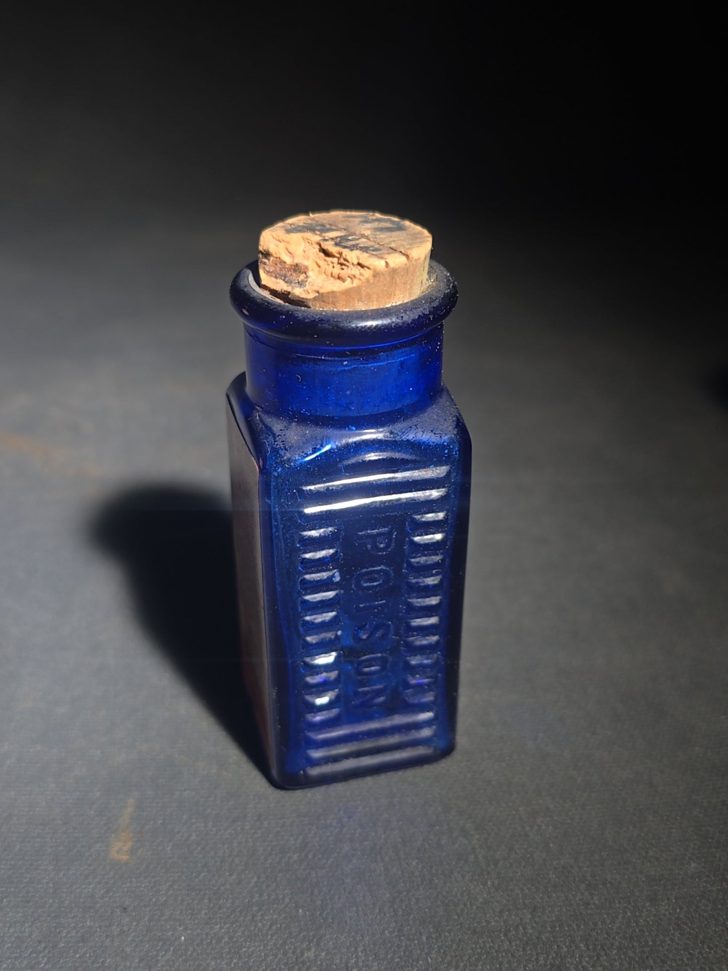 Grouping of Seven Antique and Vintage Apothecary Smalls including Belladona Leaves and Iodine Tincture Poison Bottles, Bichloride Mercury Poison Bottle, Cobalt Blue Eye Cup, and Sheaffer Skrip Ink Bottle