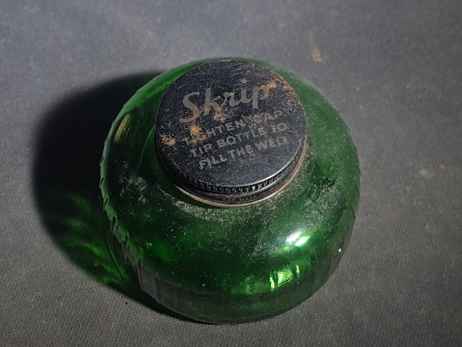 Grouping of Seven Antique and Vintage Apothecary Smalls including Belladona Leaves and Iodine Tincture Poison Bottles, Bichloride Mercury Poison Bottle, Cobalt Blue Eye Cup, and Sheaffer Skrip Ink Bottle