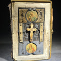 Lot 111 - Antique Hungarian-Language Catholic Prayer Book with Metal and Bone-Decorated Covers, Cross, and Religious Medallions, with Loose Holy Cards, Poor Condition, 5" H