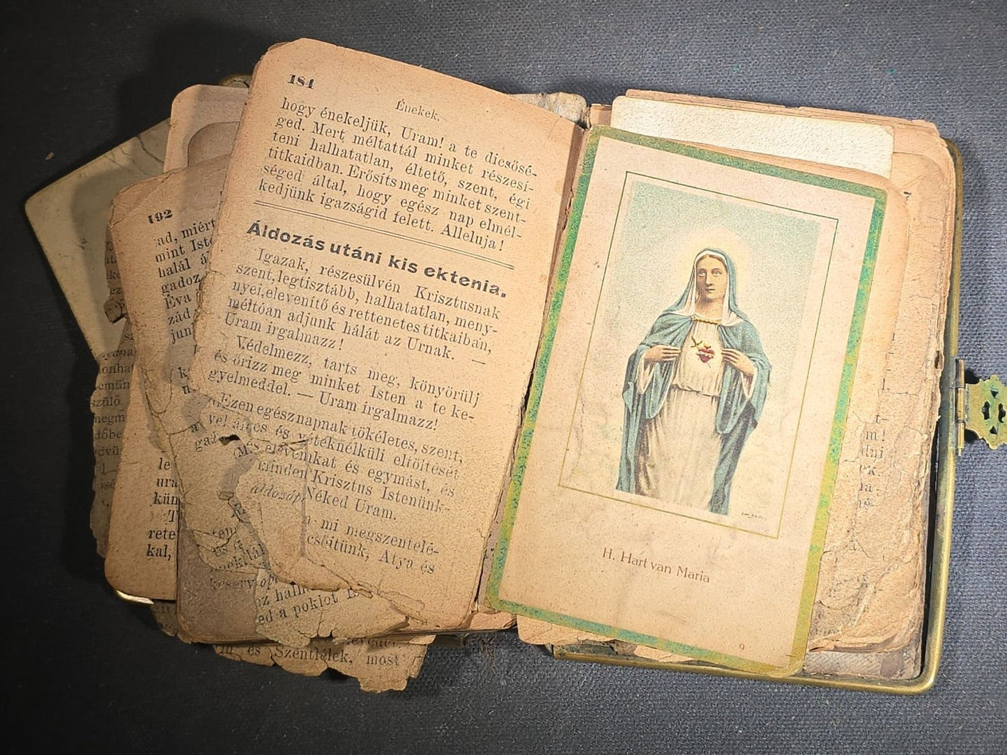 Antique Hungarian-Language Catholic Prayer Book with Metal and Bone-Decorated Covers, Cross, and Religious Medallions, with Loose Holy Cards, Poor Condition