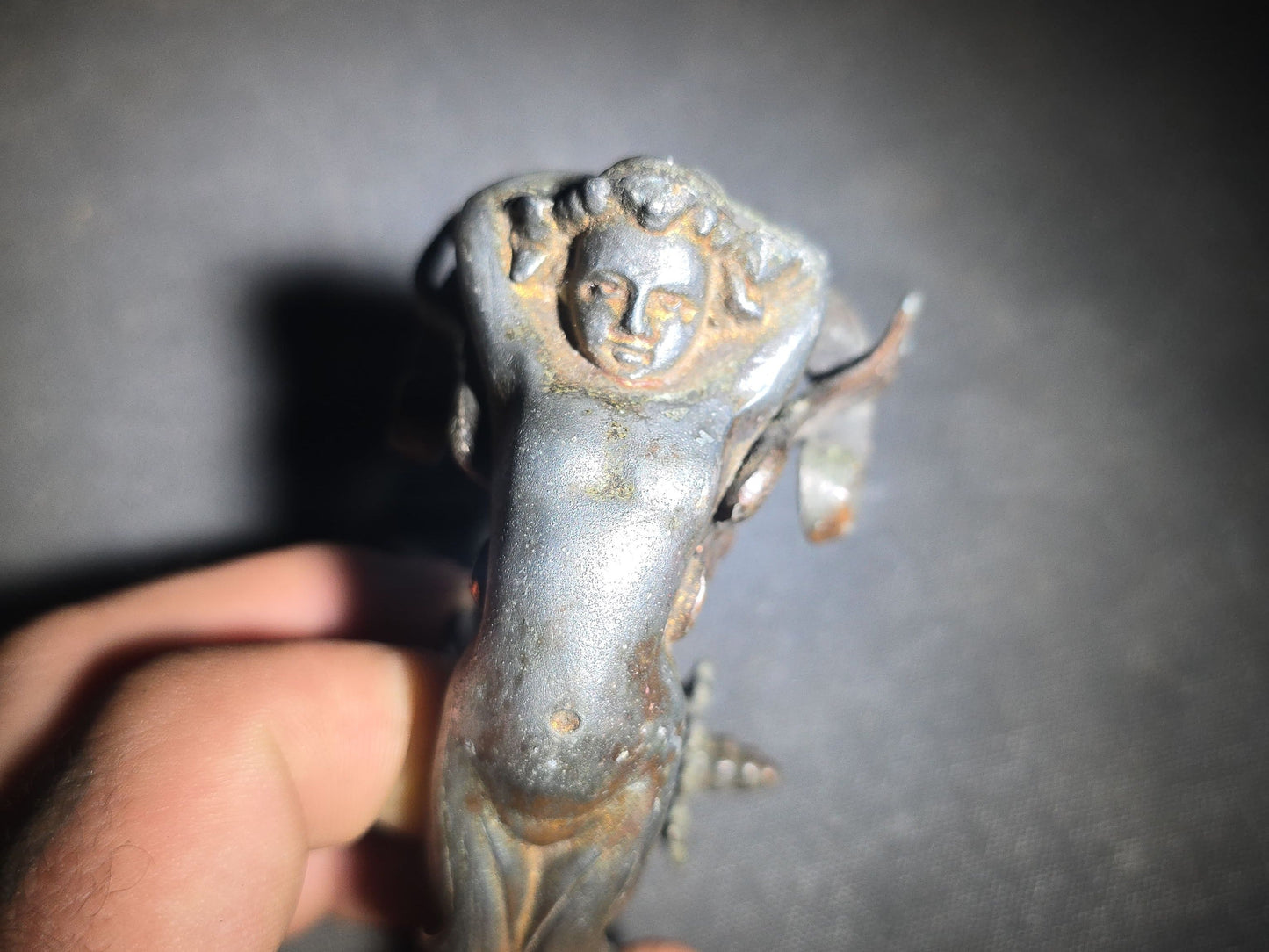 Antique Cast Metal Figural Ornament Fragment with Winged Cherub, Scrollwork, and Floral Rosette