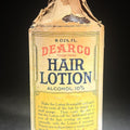Lot 044 - Antique Dearco Hair Lotion Bottle with Original Paper Wrapping and Contents, N.O.S., Manufactured by Davies, Rose & Co. (Limited), Boston, Massachusetts, 1922, 7-1/8" H
