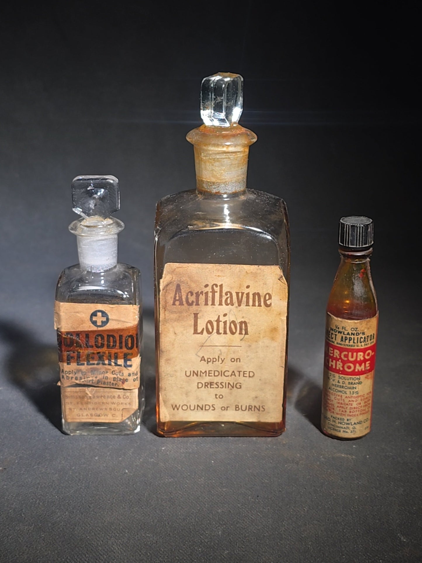 Grouping of 12 Antique and Vintage Pharmaceutical Bottles and Tins including Samson's Liniment, M.A. Thedford's Black Draught Liver Medicine, Dr. I.W. Lyon's Tooth Powder, and Johnson & Johnson Dental Floss