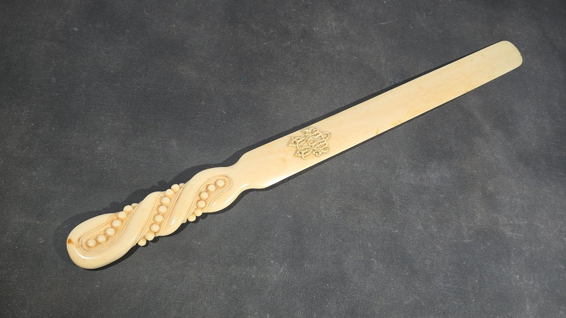Antique Victorian Ivory Page Turner with Carved Bead Handle and Applied Monogram Cartouche