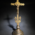 Lot 107 - Antique Brass Standing Crucifix with Corpus, Flanking Cherubs, Palmette Terminals, and Shell Motif on Turned Dome Base