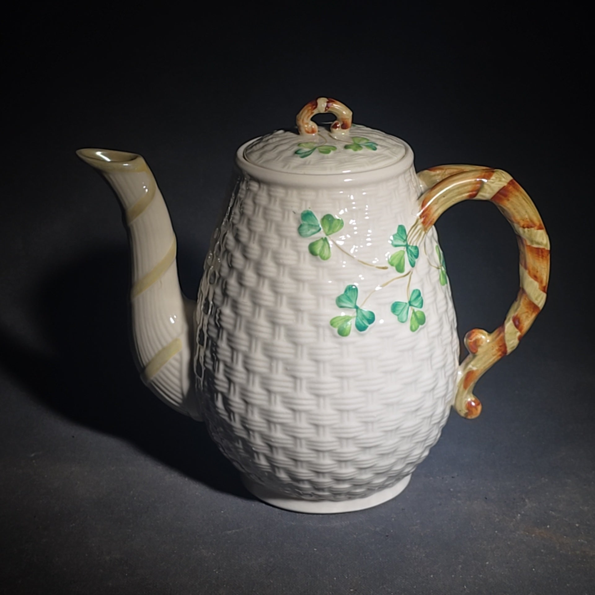 Trio of Vintage Belleek Shamrock Basketweave Pieces including Coffeepot, Creamer, and Open Sugar Bowl, Co. Fermanagh, Ireland, Note Chipping to the Creamer