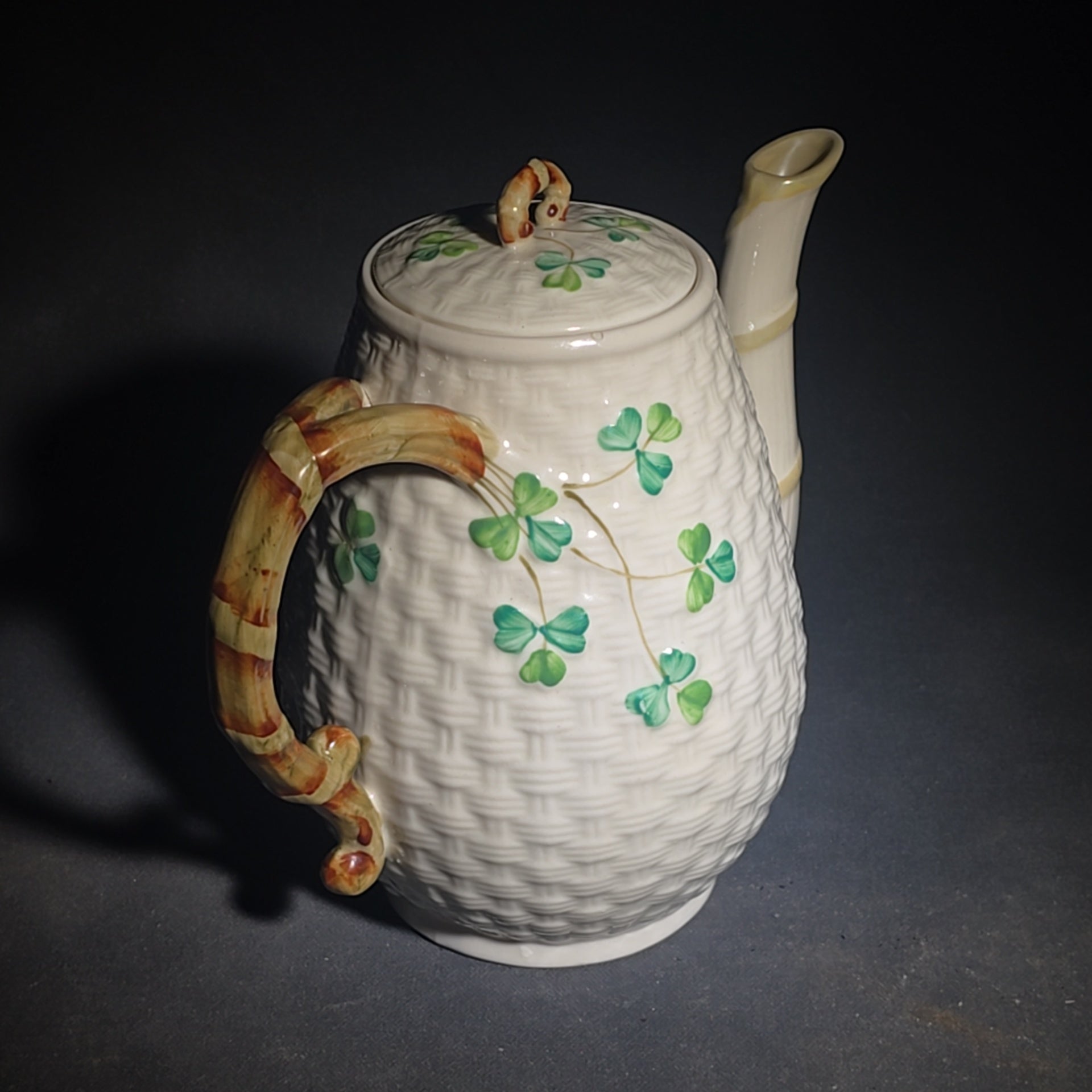 Trio of Vintage Belleek Shamrock Basketweave Pieces including Coffeepot, Creamer, and Open Sugar Bowl, Co. Fermanagh, Ireland, Note Chipping to the Creamer