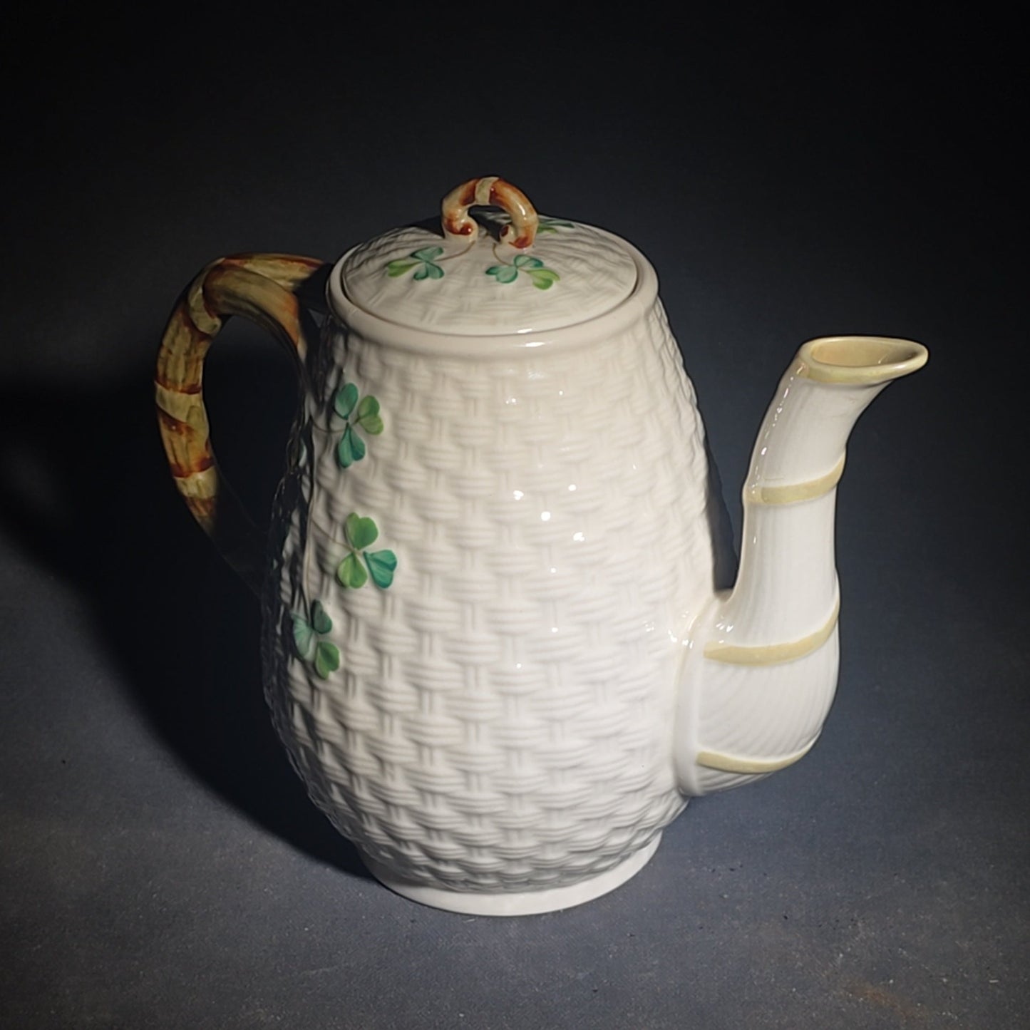 Trio of Vintage Belleek Shamrock Basketweave Pieces including Coffeepot, Creamer, and Open Sugar Bowl, Co. Fermanagh, Ireland, Note Chipping to the Creamer