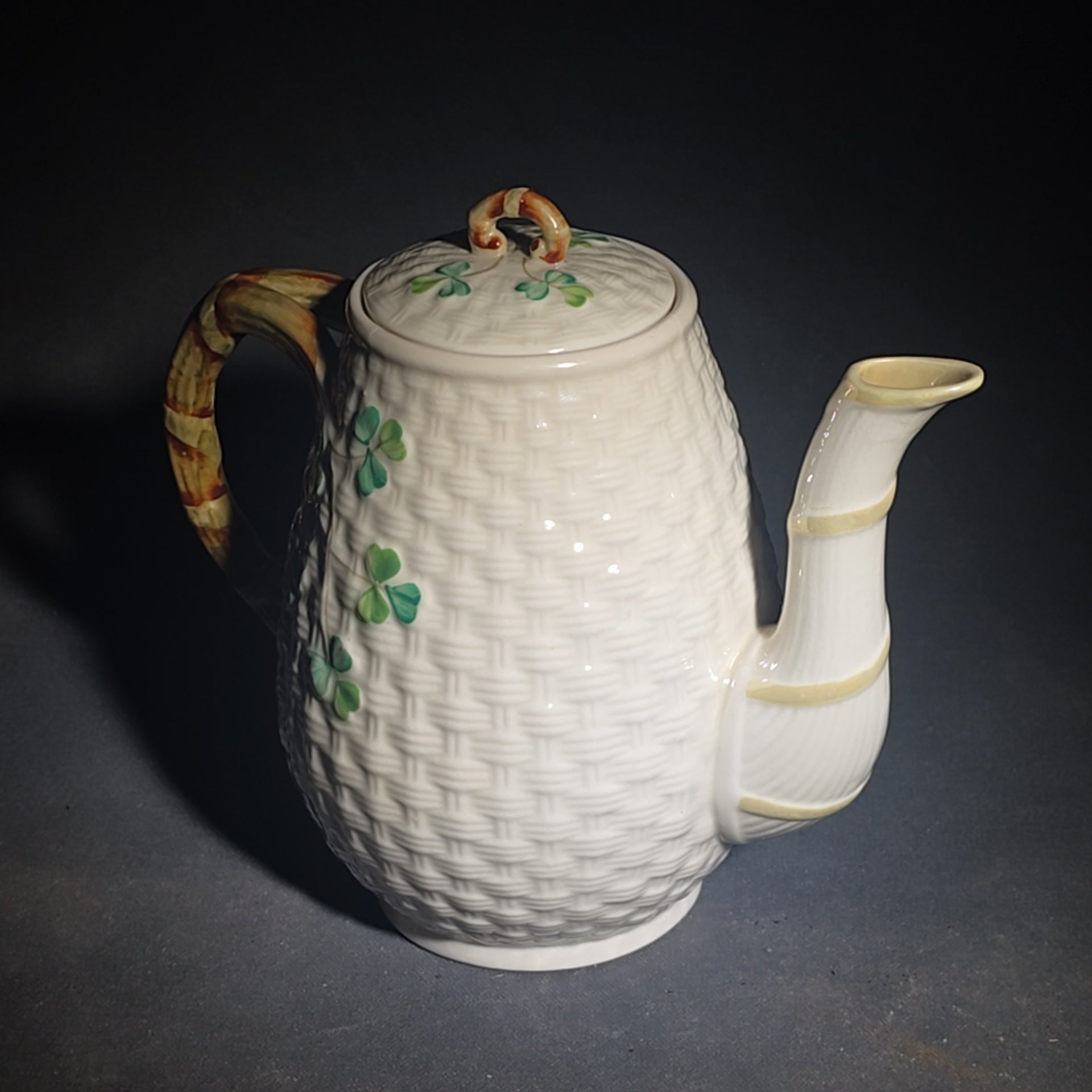 Trio of Vintage Belleek Shamrock Basketweave Pieces including Coffeepot, Creamer, and Open Sugar Bowl, Co. Fermanagh, Ireland, Note Chipping to the Creamer