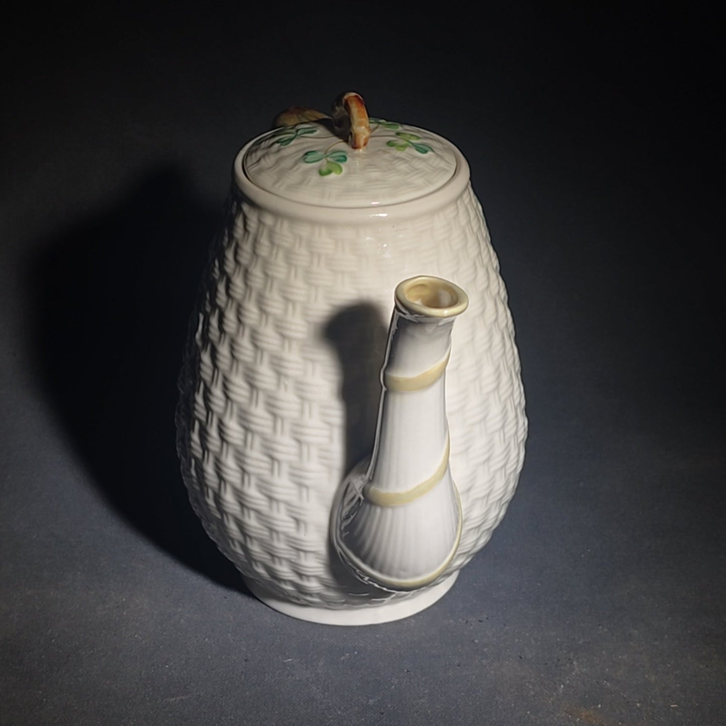 Trio of Vintage Belleek Shamrock Basketweave Pieces including Coffeepot, Creamer, and Open Sugar Bowl, Co. Fermanagh, Ireland, Note Chipping to the Creamer