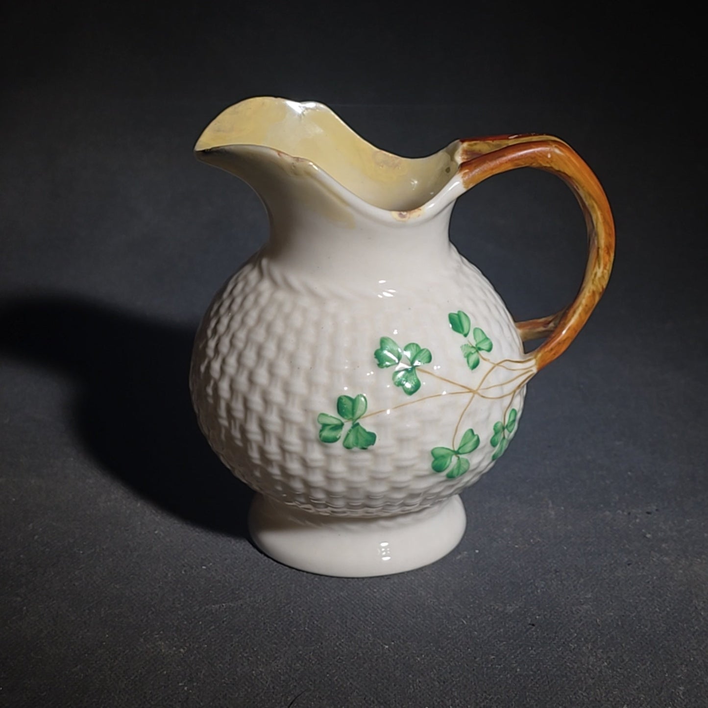 Trio of Vintage Belleek Shamrock Basketweave Pieces including Coffeepot, Creamer, and Open Sugar Bowl, Co. Fermanagh, Ireland, Note Chipping to the Creamer