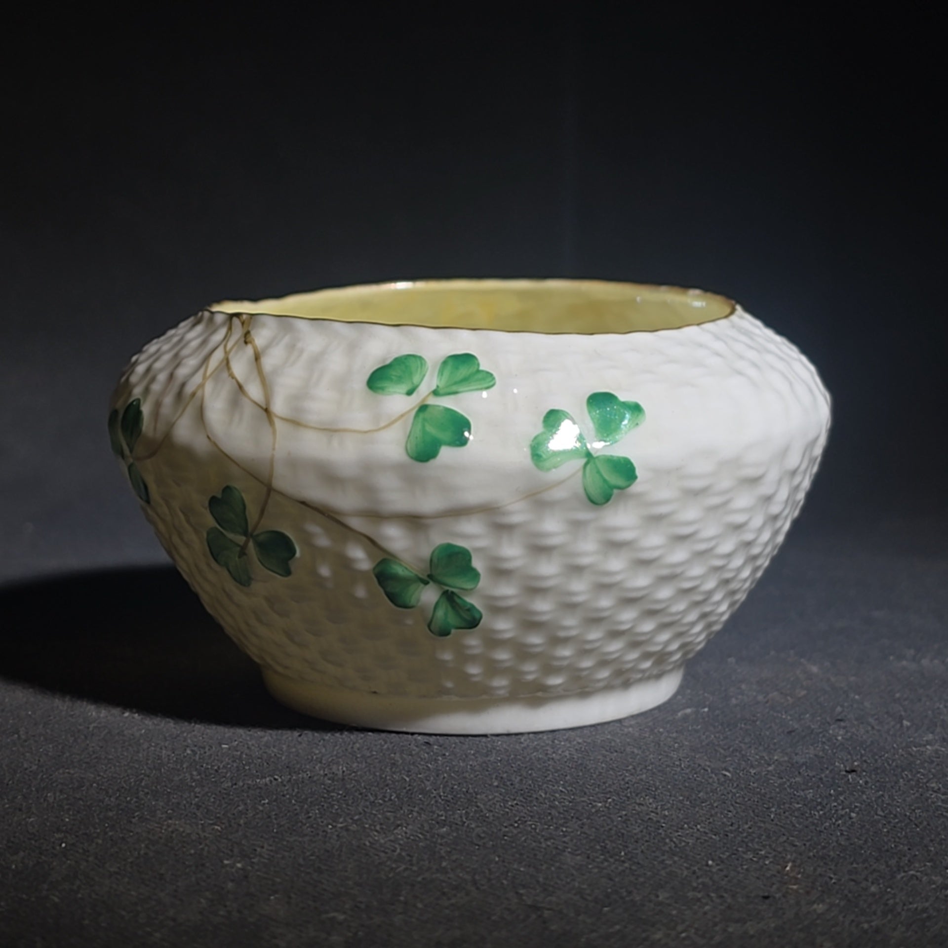 Trio of Vintage Belleek Shamrock Basketweave Pieces including Coffeepot, Creamer, and Open Sugar Bowl, Co. Fermanagh, Ireland, Note Chipping to the Creamer