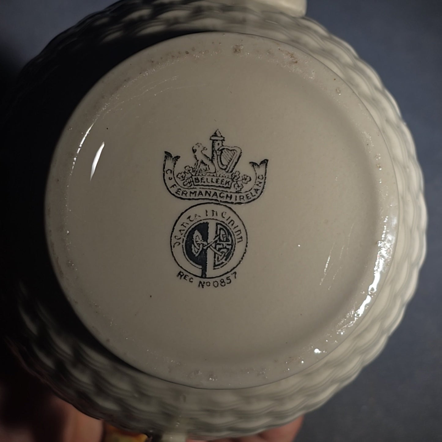 Trio of Vintage Belleek Shamrock Basketweave Pieces including Coffeepot, Creamer, and Open Sugar Bowl, Co. Fermanagh, Ireland, Note Chipping to the Creamer