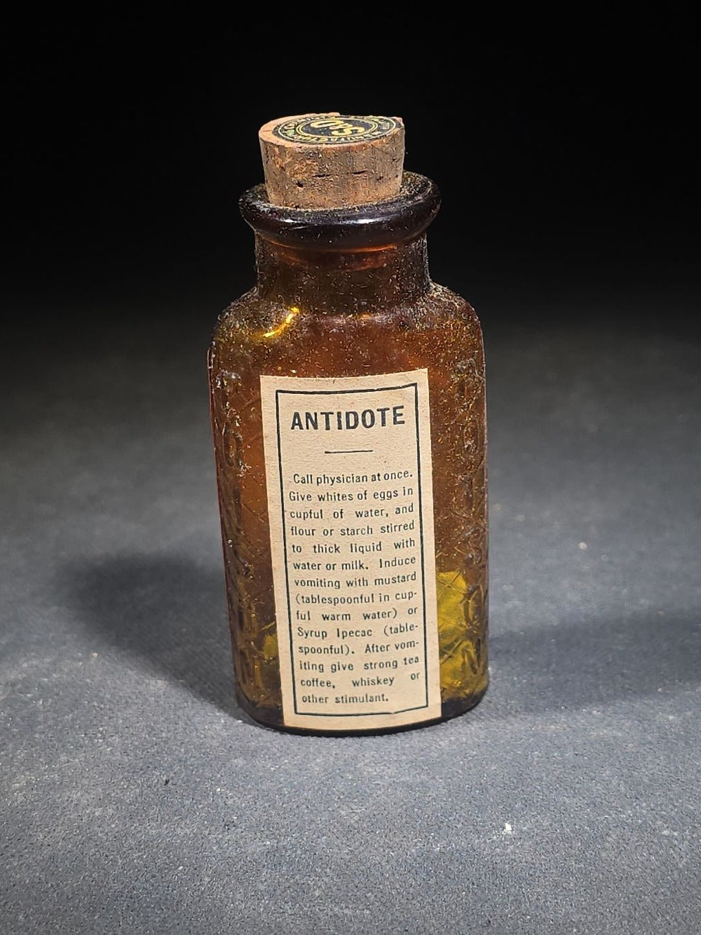 Antique Sharp & Dohme's No. 25 Green Antiseptic Disks Embossed Amber Poison Bottle with Cork, Antidote Label, and Original Cardboard Tube, Baltimore, Maryland