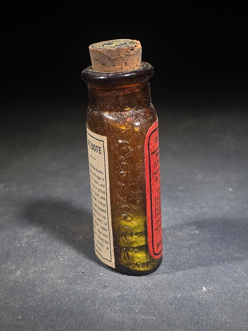Antique Sharp & Dohme's No. 25 Green Antiseptic Disks Embossed Amber Poison Bottle with Cork, Antidote Label, and Original Cardboard Tube, Baltimore, Maryland