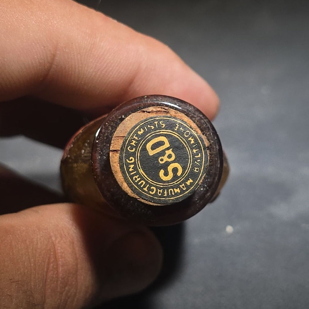 Antique Sharp & Dohme's No. 25 Green Antiseptic Disks Embossed Amber Poison Bottle with Cork, Antidote Label, and Original Cardboard Tube, Baltimore, Maryland
