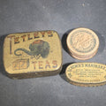 Lot 047 - Trio of Antique Advertising Tins and Apothecary Containers Including Tetley's Teas with Elephant Trademark, Dr. Schenck's Mandrake Pills by J.H. Schenck & Son of Philadelphia, and Weeks & Badger Apothecaries Pill Box from Boston, Massachusetts