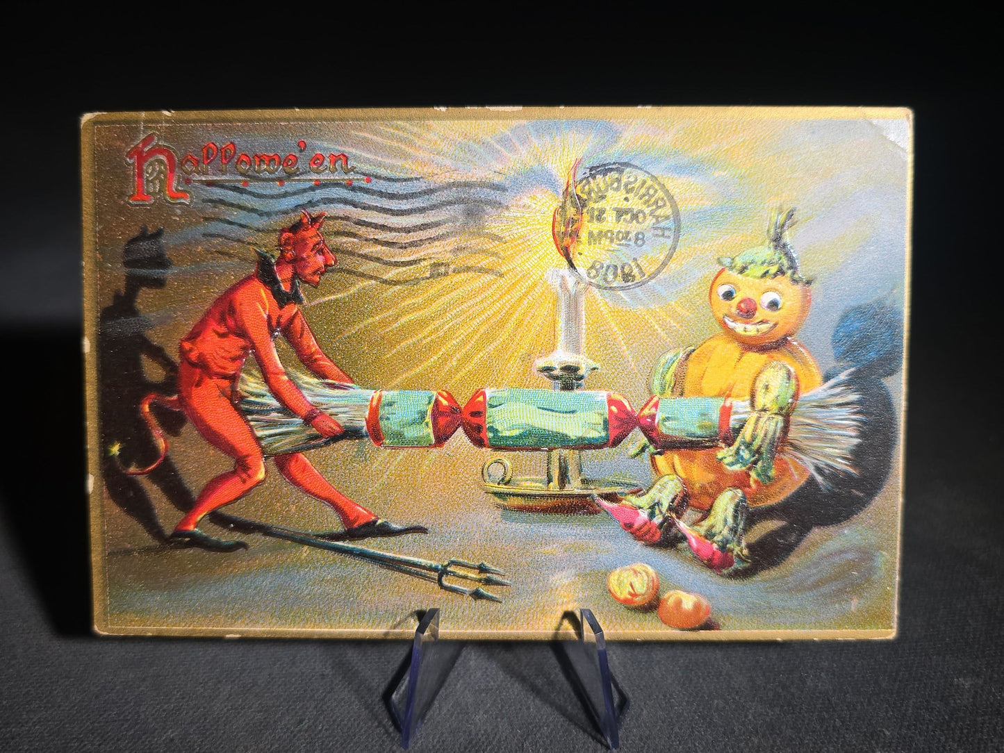 Antique Raphael Tuck & Sons "Hallowe'en" Postcard Series No. 150 with Devil and Jack-O-Lantern Man Pulling a Cracker, Postmarked October 31, 1908, Harrisburg, Pennsylvania
