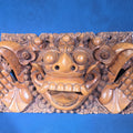Lot 145 - Vintage Carved Wood Balinese Barong Wall Panel, Inscribed Ubud, Lodtunduh, I W. Retig, 18-5/8" L x 11" H