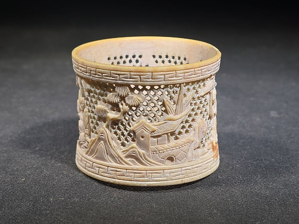 Antique Chinese Carved and Reticulated Bone Napkin Ring with Figures in Landscape and Geometric Borders