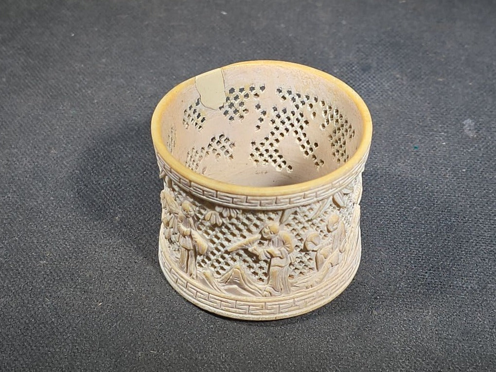Antique Chinese Carved and Reticulated Bone Napkin Ring with Figures in Landscape and Geometric Borders