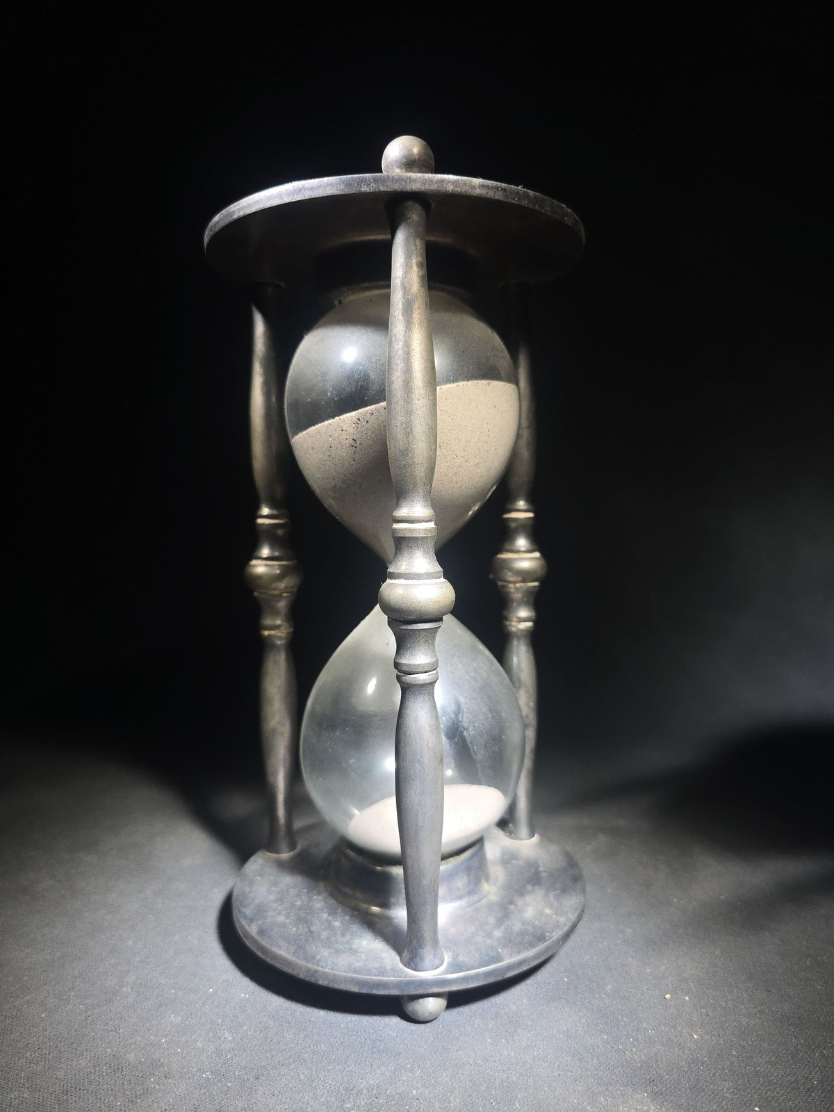 Vintage Pewter-Tone Metal Hourglass Sand Timer with Turned Spindle Columns and Ball Feet