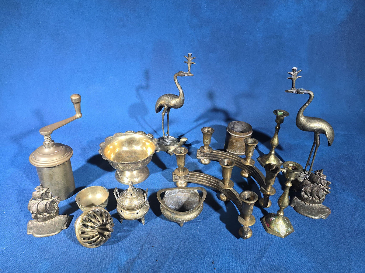 Grouping of Vintage Brass Items including Figural Crane Candlesticks, Candelabra, Pedestal Bowl, Incense Burner, Pepper Grinder, and Ship Bookends