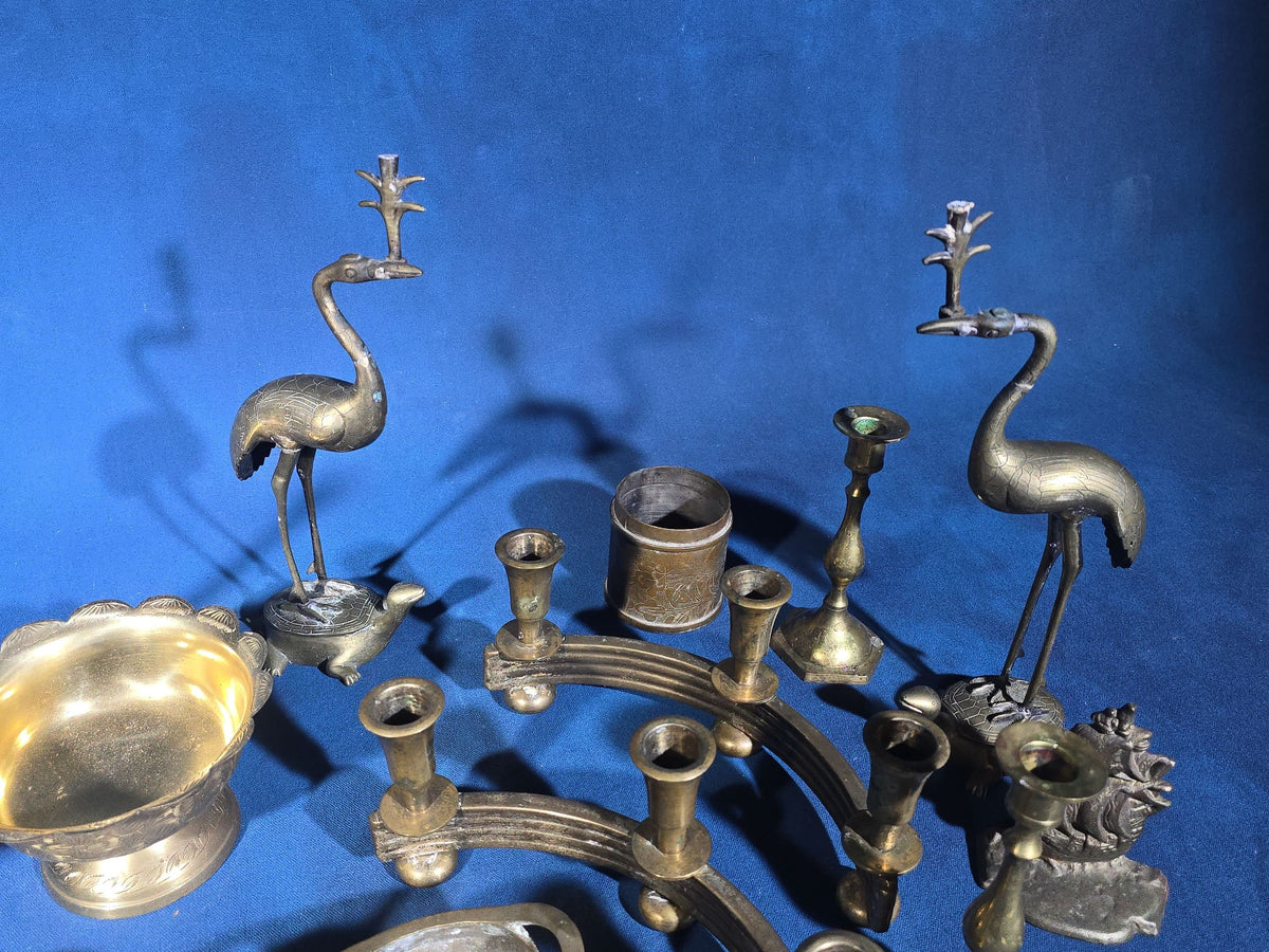Grouping of Vintage Brass Items including Figural Crane Candlesticks, Candelabra, Pedestal Bowl, Incense Burner, Pepper Grinder, and Ship Bookends