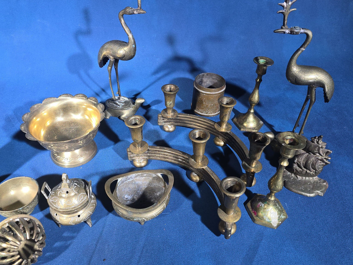 Grouping of Vintage Brass Items including Figural Crane Candlesticks, Candelabra, Pedestal Bowl, Incense Burner, Pepper Grinder, and Ship Bookends