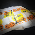 Lot 112 - Vintage Halloween Crepe Paper Tablecloth with Jack-O-Lantern, Owl, and Full Moon Graphics, Note Holes
