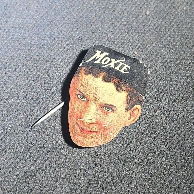 Antique Moxie Soda Die-Cut Tin Lithograph Advertising Pin with Moxie Boy