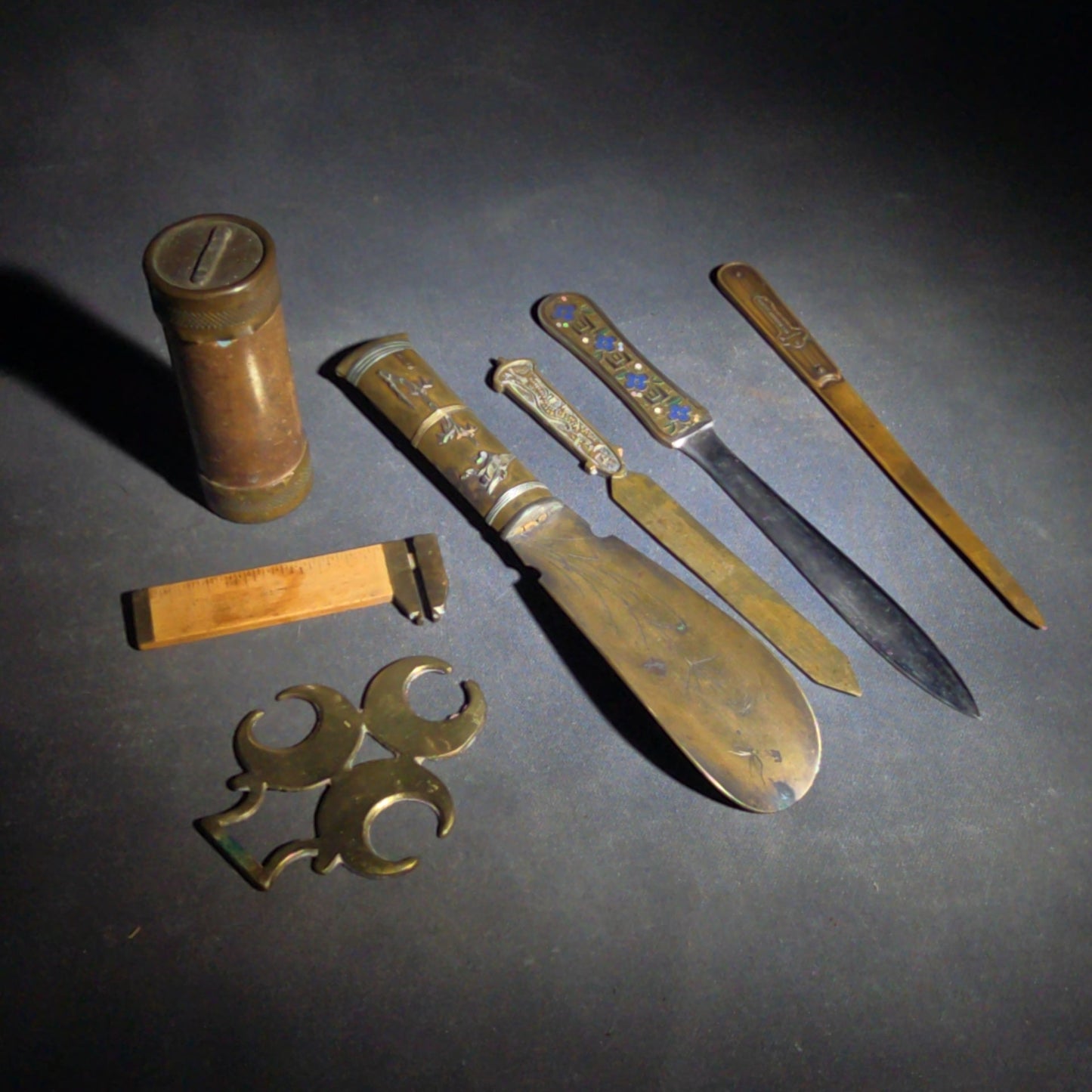 Grouping of Seven Antique and Vintage Smalls including Four Letter Openers, Brass Buckle, Stanley Ruler, and Screw-Top Drill Bit Holder