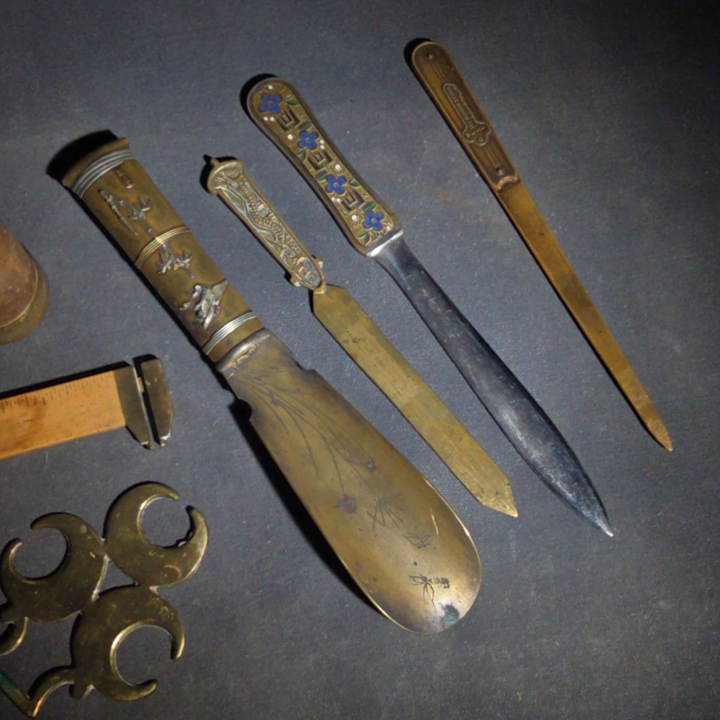 Grouping of Seven Antique and Vintage Smalls including Four Letter Openers, Brass Buckle, Stanley Ruler, and Screw-Top Drill Bit Holder