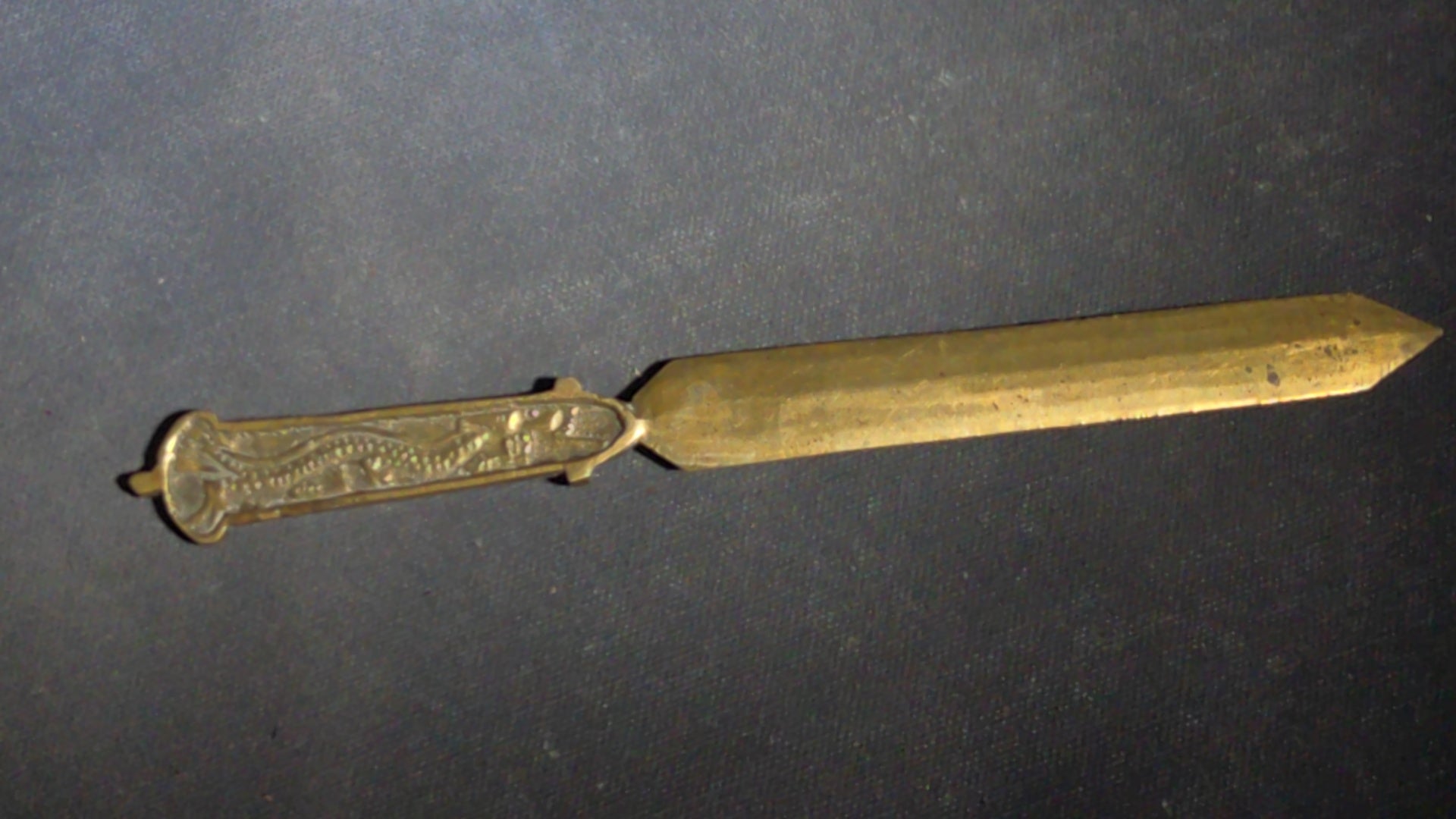 Grouping of Seven Antique and Vintage Smalls including Four Letter Openers, Brass Buckle, Stanley Ruler, and Screw-Top Drill Bit Holder