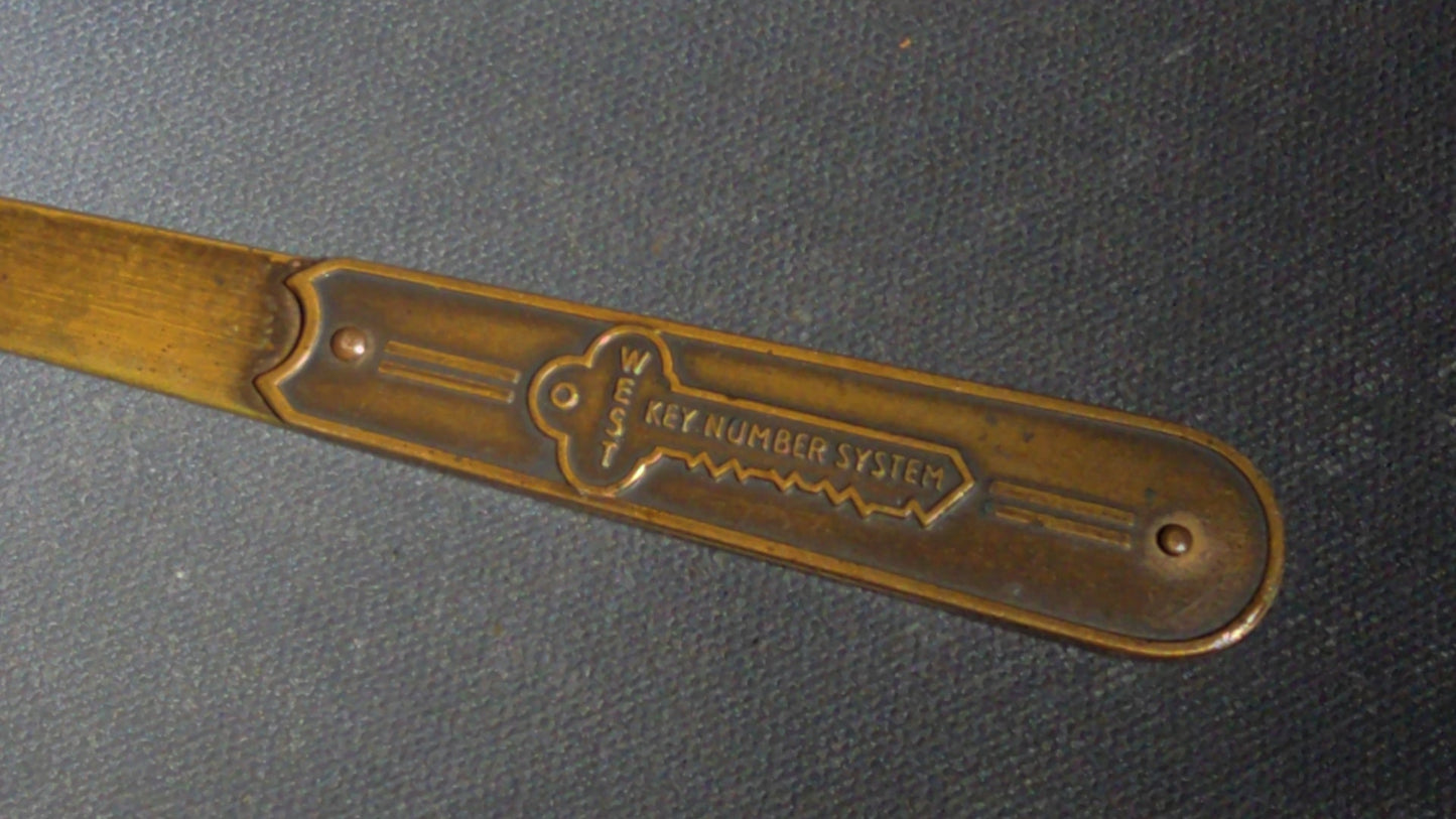 Grouping of Seven Antique and Vintage Smalls including Four Letter Openers, Brass Buckle, Stanley Ruler, and Screw-Top Drill Bit Holder