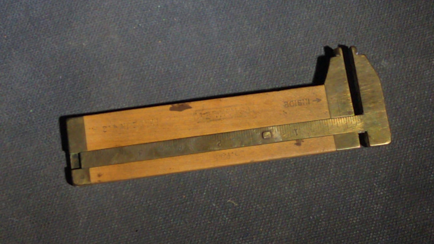 Grouping of Seven Antique and Vintage Smalls including Four Letter Openers, Brass Buckle, Stanley Ruler, and Screw-Top Drill Bit Holder