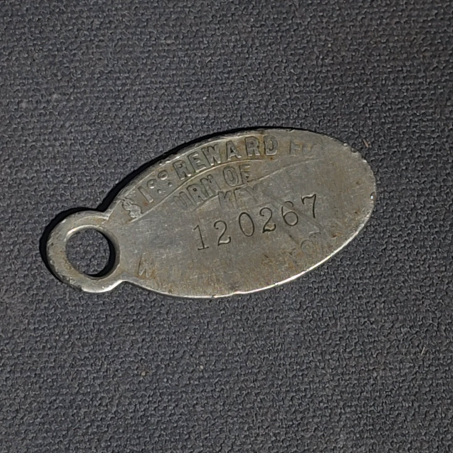 Grouping of Vintage and Modern Smalls including Carved Wood Figure, Carved Netsuke-Style Figure, U.S.M.C. Pin, United States Army Dog Tag Pendant, and Miniature Padlock