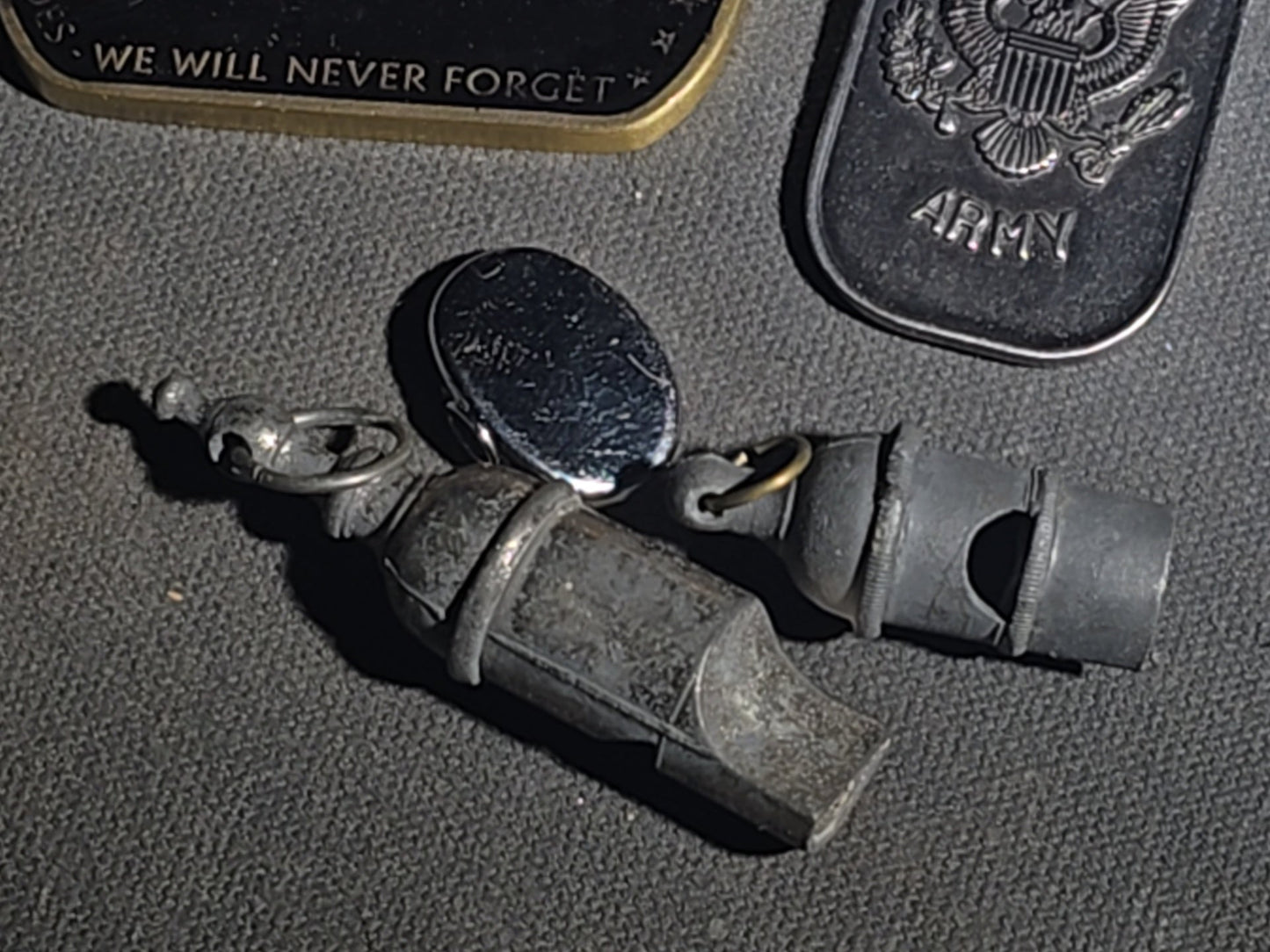 Grouping of Vintage and Modern Smalls including Carved Wood Figure, Carved Netsuke-Style Figure, U.S.M.C. Pin, United States Army Dog Tag Pendant, and Miniature Padlock