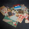 Lot 116 - Grouping of 25+ Antique and Vintage Valentines, Postcards, Trade Cards, and Die-Cut Ephemera Including Mechanical Chalkboard Valentine, Peck & Parker Owls Trade Card, and Essex County Club Manchester, Massachusetts Postcard